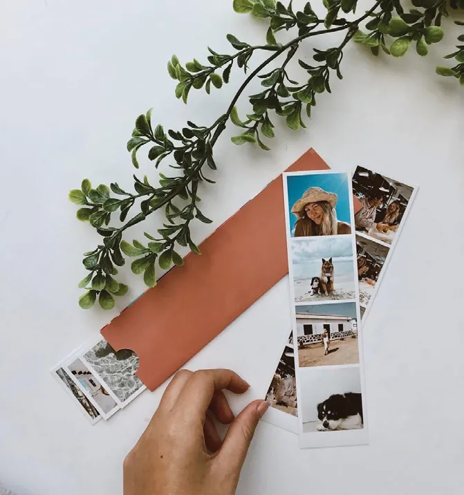 Assorted instant photo strips flat lay